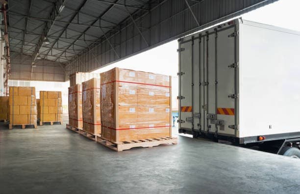 Wrapped pallets on the loading dock, ready to be loaded into a freight vehicle